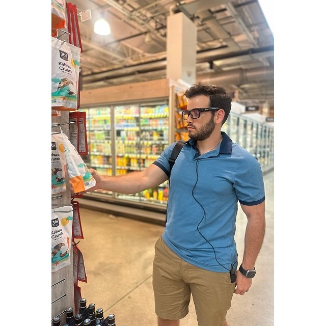 Man wears Brite AI Vision glasses